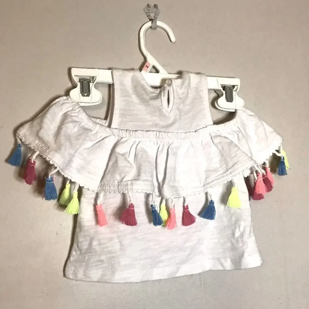 NEW Mudpie “encanto” Pinafore white multicolor Tassel cold shoulder top 6-9 mths